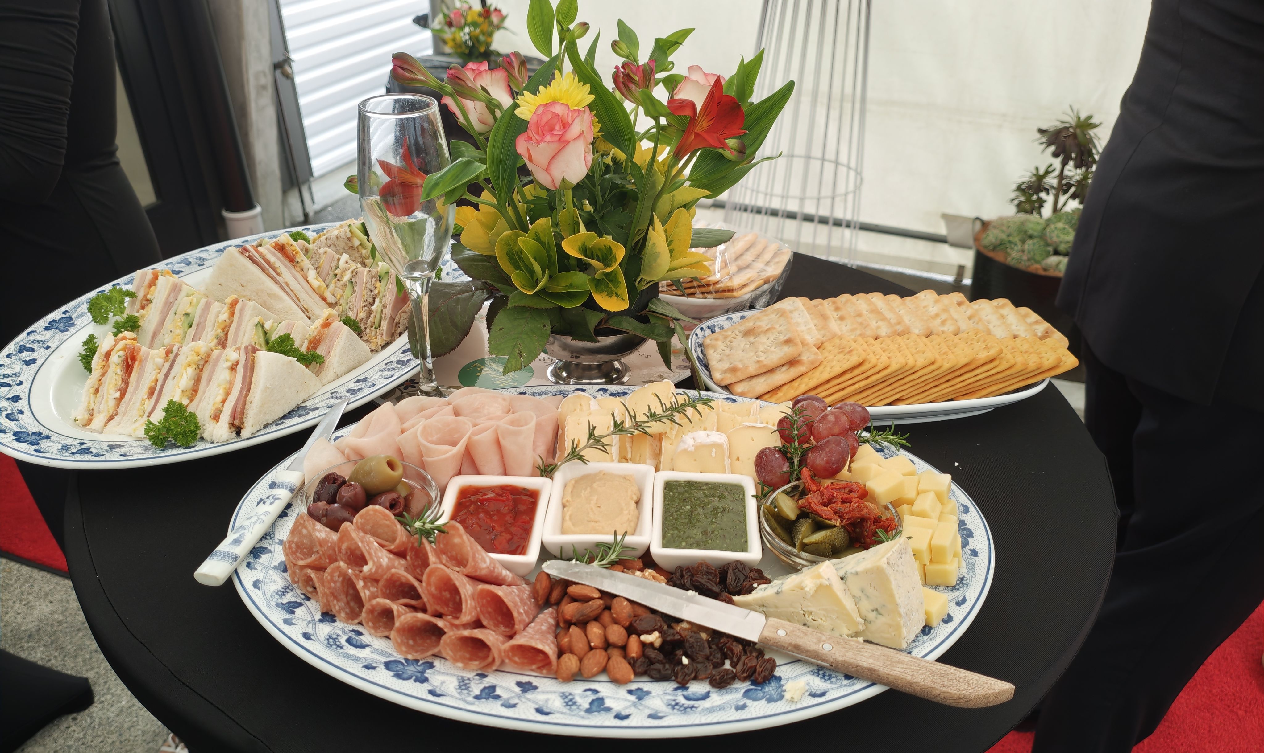 Platter with wine glass on bar stool
